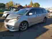 2011 Toyota Sienna SE with VIN 5TDXK3DC0BS150981, listed as a Copart auction lot 83873885 with 91,115 mi miles and Salvage title. Bid and sale history available at DreamBid. Image 1.