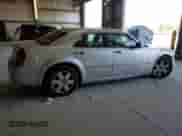 2005 Chrysler 300 300C AWD with VIN 2C3AK63H65H638909, listed as a Copart auction lot 81298895 with 237,011 mi miles and Salvage title. Bid and sale history available at DreamBid. Image 3.