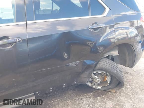 2014 Chevrolet Equinox LT with VIN 2GNALBEK7E6245563, listed as a IAAI auction lot 43448575 with 99,277 mi miles and . Bid and sale history available at DreamBid. Image 14.