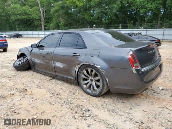 2014 Chrysler 300 S с VIN 2C3CCABT4EH281504, выставлен на аукционе Copart как лот 63461985 с пробегом 77 805 миль миль и Списание • Salvage title. История ставок и продаж доступна на DreamBid. Изображение 2.