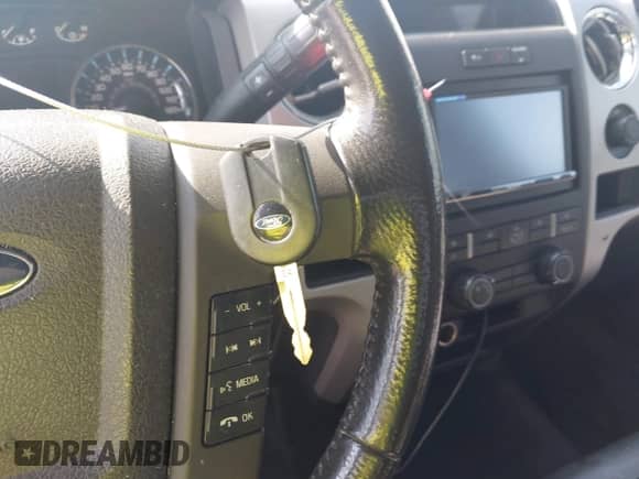 2012 Ford F-150 Lariat with VIN 1FTFW1CT6CFC93697, listed as a IAAI auction lot 43575540 with 195,786 mi miles and . Bid and sale history available at DreamBid. Image 11.