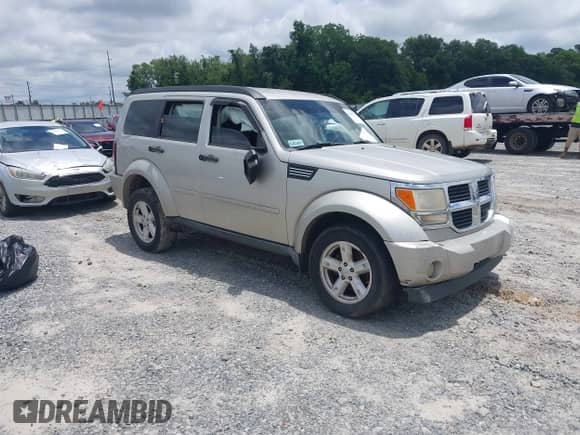 2009 Dodge Nitro SE z VIN 1D8GT28K79W532123, wystawiony jako IAAI lot #42627816 z przebiegiem 227 864 mil mil oraz . Historia ofert i sprzedaży dostępna na DreamBid. Obrazek 1.