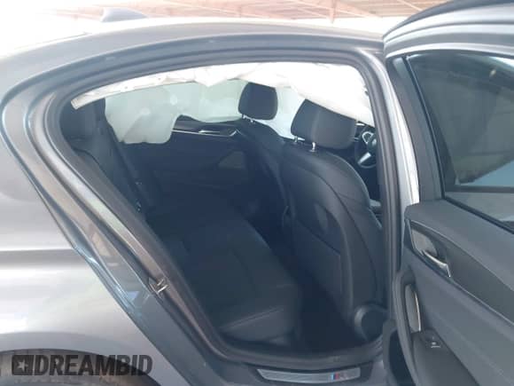 2023 BMW 5 Series 540i z VIN WBA53BJ00PWY07033, wystawiony jako IAAI lot #42421152 z przebiegiem 4 931 mil mil oraz . Historia ofert i sprzedaży dostępna na DreamBid. Obrazek 8.