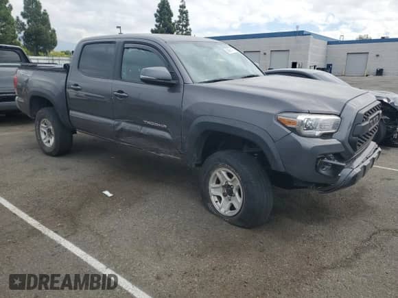 2016 Toyota Tacoma SR with VIN 5TFCZ5AN3GX010517, listed as a Copart auction lot 80681475 with 174,938 mi miles and Salvage title. Bid and sale history available at DreamBid. Image 4.