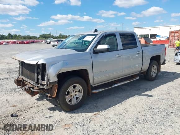 2017 Chevrolet Silverado 1500 LT with VIN 3GCPCREH3HG414129, listed as a IAAI auction lot 43456728 with 163,489 mi miles and . Bid and sale history available at DreamBid. Image 2.