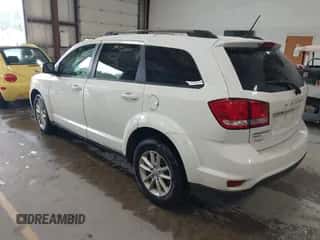 2017 Dodge Journey SXT with VIN 3C4PDDBG9HT618257, listed as a IAAI auction lot 42723139 with 105,486 mi miles and . Bid and sale history available at DreamBid. Image 3.
