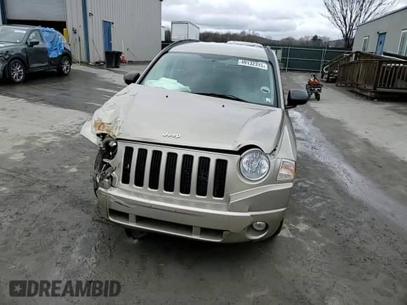 2010 Jeep Compass Latitude с VIN 1J4NF1FB5AD623461, выставлен на аукционе Copart как лот 49132315 с пробегом 113 496 миль миль и Списание • Salvage title. История ставок и продаж доступна на DreamBid. Изображение 12.