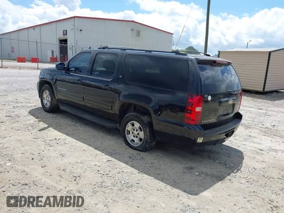 2010 Chevrolet Suburban LT z VIN 1GNUCJE08AR192831, wystawiony jako IAAI lot #42534754 z przebiegiem 165 741 mil mil oraz . Historia ofert i sprzedaży dostępna na DreamBid. Obrazek 3.