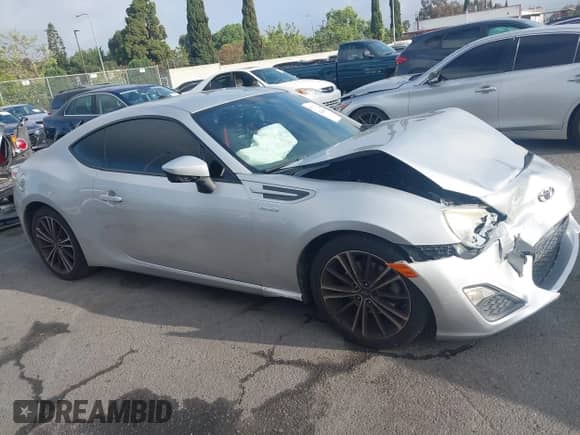 2014 Scion FR-S z VIN JF1ZNAA10E8702937, wystawiony jako IAAI lot #42243654 z przebiegiem 130 344 mil mil oraz . Historia ofert i sprzedaży dostępna na DreamBid. Obrazek 13.