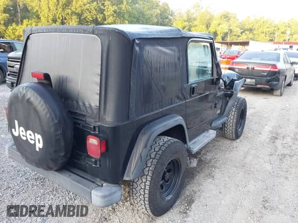 2001 Jeep Wrangler SE with VIN 1J4FA29P01P350847, listed as a IAAI auction lot 42821806 with 205,522 mi miles and . Bid and sale history available at DreamBid. Image 4.