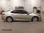 2022 Toyota Camry LE with VIN 4T1C11AK2NU052242, listed as a IAAI auction lot 42943151 with 213,562 mi miles and . Bid and sale history available at DreamBid. Image 14.