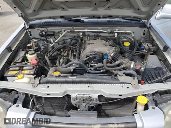 2002 Nissan Frontier SE с VIN 1N6ED29X22C356308, выставлен на аукционе Copart как лот 66738245 с пробегом 232 178 миль миль и Списание • Salvage title. История ставок и продаж доступна на DreamBid. Изображение 11.