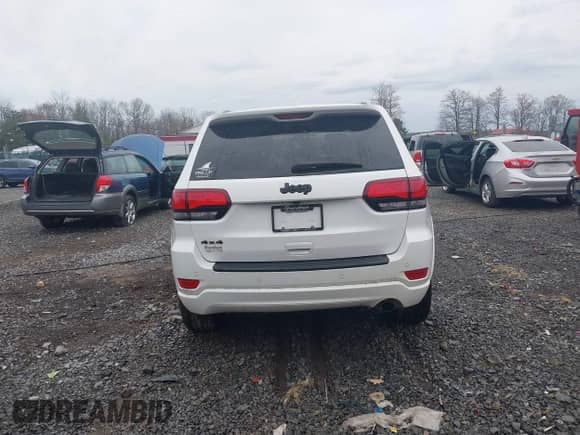 2021 Jeep Grand Cherokee Laredo E z VIN 1C4RJFAG4MC771925, wystawiony jako IAAI lot #41947203 z przebiegiem 85 734 mil mil oraz . Historia ofert i sprzedaży dostępna na DreamBid. Obrazek 16.