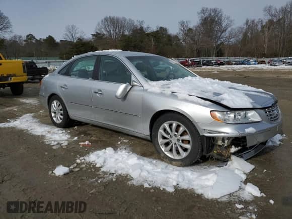 2007 Hyundai Azera SE z VIN KMHFC46F47A188591, wystawiony jako Copart lot #87225494 z przebiegiem 86 047 mil mil oraz Szkoda całkowita • Salvage title. Historia ofert i sprzedaży dostępna na DreamBid. Obrazek 4.