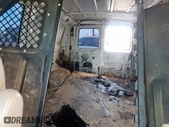 2013 Ford Econoline Cargo Commercial with VIN 1FTNE2EL4DDB28259, listed as a Copart auction lot 61208275 with 216,758 mi miles and Salvage title. Bid and sale history available at DreamBid. Image 10.