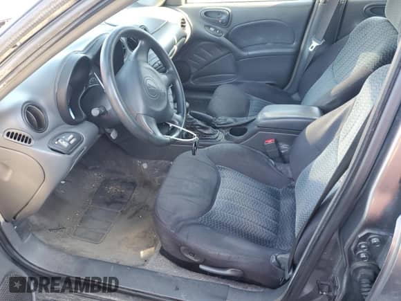 2004 Pontiac Grand Am SE1 with VIN 1G2NF52F44M517470, listed as a Copart auction lot 88480615 with 198,642 mi miles and Salvage title. Bid and sale history available at DreamBid. Image 7.