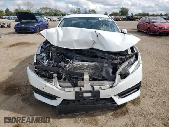 2016 Honda Civic LX с VIN 19XFC2F5XGE000850, выставлен на аукционе Copart как лот 83997905 с пробегом 112 463 миль миль и Списание • Salvage title. История ставок и продаж доступна на DreamBid. Изображение 5.