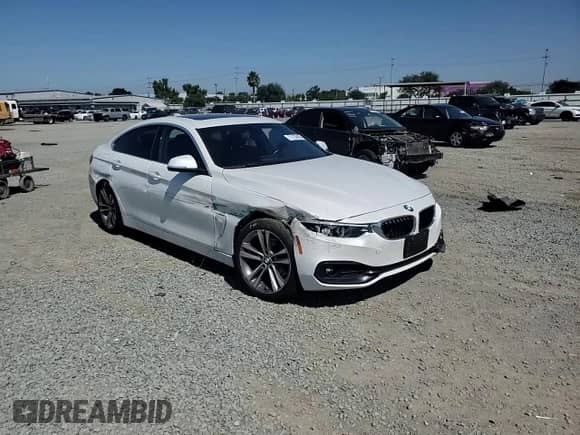 2019 BMW 4 Series 430i with VIN WBA4J1C51KBM19099, listed as a Copart auction lot 71732405 with 54,889 mi miles and Salvage title. Bid and sale history available at DreamBid. Image 13.