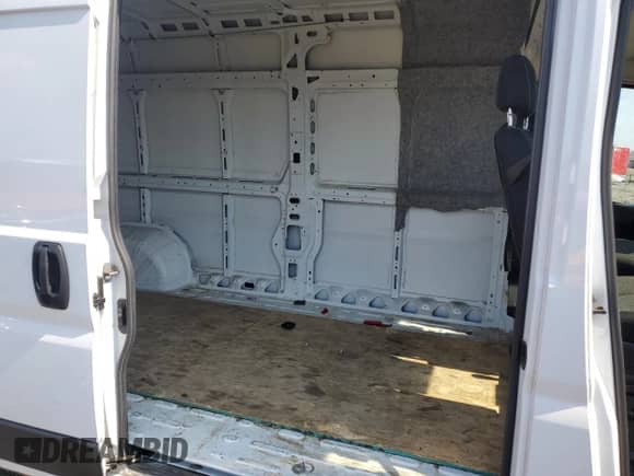 2023 Ram ProMaster Cargo с VIN 3C6MRVJG8PE569042, выставлен на аукционе Copart как лот 63868665 с пробегом 119 671 миль миль и Списание • Salvage title. История ставок и продаж доступна на DreamBid. Изображение 11.