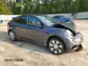 2023 Tesla Model Y Long Range with VIN 7SAYGAEE4PF668889, listed as a Copart auction lot 67239314 with 26,874 mi miles and Salvage title. Bid and sale history available at DreamBid. Image 4.
