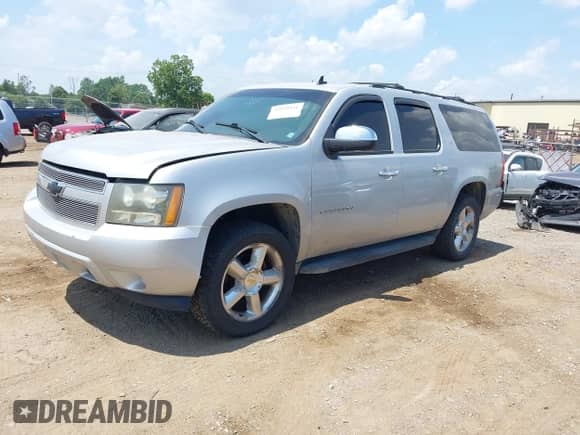 2010 Chevrolet Suburban LT with VIN 1GNUKJE39AR134756, listed as a IAAI auction lot 42824041 with Not provided miles and . Bid and sale history available at DreamBid. Image 2.