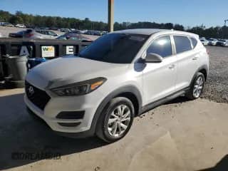 2019 Hyundai Tucson SE with VIN KM8J2CA41KU842290, listed as a Copart auction lot 86243195 with 122,407 mi miles and Clean title. Bid and sale history available at DreamBid. Image 1.