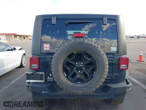 2018 Jeep Wrangler Sport z VIN 1C4AJWAG3JL889621, wystawiony jako IAAI lot #42034854 z przebiegiem 61 505 mil mil oraz . Historia ofert i sprzedaży dostępna na DreamBid. Obrazek 16.