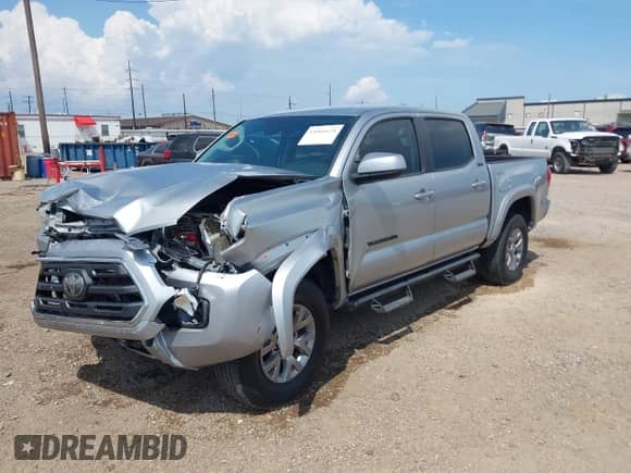 2019 Toyota Tacoma SR5 with VIN 3TMAZ5CN9KM102668, listed as a IAAI auction lot 43060428 with 59,956 mi miles and . Bid and sale history available at DreamBid. Image 2.