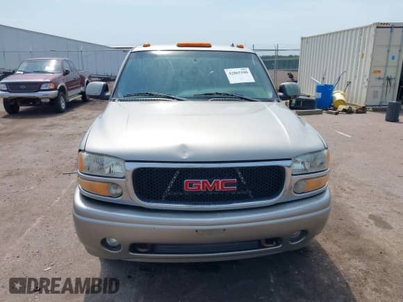 2002 GMC Sierra 1500 Denali z VIN 2GTFK69U621313333, wystawiony jako IAAI lot #42865188 z przebiegiem 200 820 mil mil oraz . Historia ofert i sprzedaży dostępna na DreamBid. Obrazek 12.