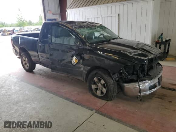 2024 Ram 1500 SLT with VIN 1C6RR7GG1RS147574, listed as a Copart auction lot 66308765 with 28,206 mi miles and Non repairable. Bid and sale history available at DreamBid. Image 4.