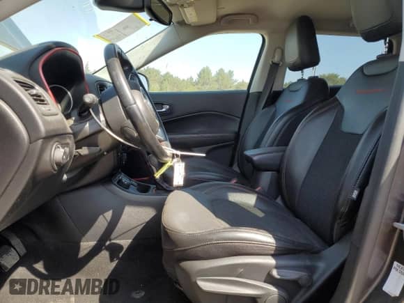 2020 Jeep Compass Trailhawk with VIN 3C4NJDDBXLT163395, listed as a Copart auction lot 81366435 with 56,199 mi miles and Salvage title. Bid and sale history available at DreamBid. Image 7.