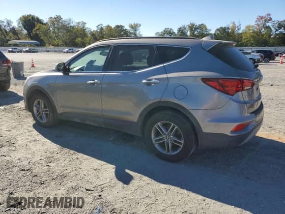 2018 Hyundai Santa Fe 2.4L z VIN 5XYZU3LB5JG553846, wystawiony jako Copart lot #86448105 z przebiegiem 233 991 mil mil oraz Czysty tytuł • Clean title. Historia ofert i sprzedaży dostępna na DreamBid. Obrazek 2.
