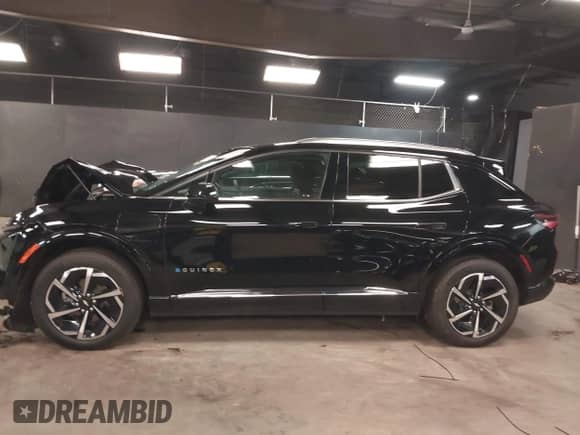 2024 Chevrolet Equinox EV LT z VIN 3GN7DLRP1RS247819, wystawiony jako IAAI lot #42432618 z przebiegiem 11 495 mil mil oraz . Historia ofert i sprzedaży dostępna na DreamBid. Obrazek 14.