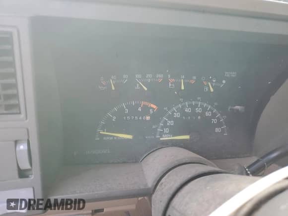 1994 GMC Sierra 1500 with VIN 2GTEK19K1R1548357, listed as a Copart auction lot 82556885 with 157,548 mi miles and Clean title. Bid and sale history available at DreamBid. Image 9.