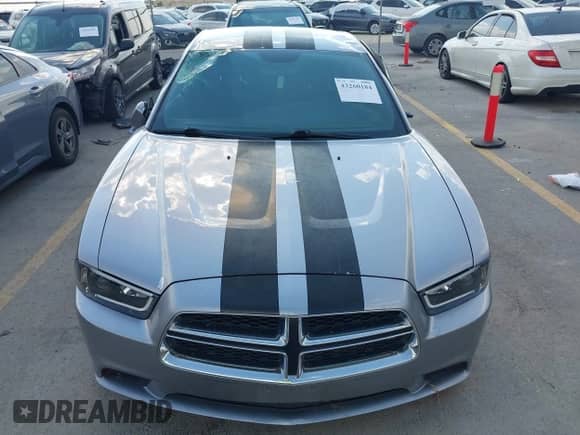 2013 Dodge Charger SE с VIN 2C3CDXBG3DH725442, выставлен на аукционе IAAI как лот 43260184 с пробегом 129 411 миль миль и . История ставок и продаж доступна на DreamBid. Изображение 13.