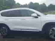 2020 Hyundai Santa Fe SEL with VIN 5NMS3CAA4LH176420, listed as a IAAI auction lot 42472600 with 59,221 mi miles and . Bid and sale history available at DreamBid. Image 13.