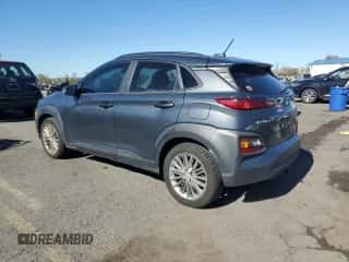 2021 Hyundai Kona SEL z VIN KM8K2CAA5MU718004, wystawiony jako Copart lot #87082665 z przebiegiem 57 972 mil mil oraz Szkoda całkowita • Salvage title. Historia ofert i sprzedaży dostępna na DreamBid. Obrazek 2.