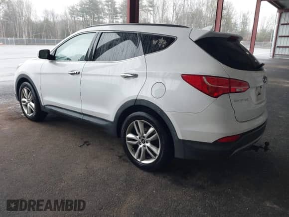 2015 Hyundai Santa Fe with VIN 5XYZWDLA2FG257231, listed as a IAAI auction lot 41868240 with 218,321 mi miles and . Bid and sale history available at DreamBid. Image 3.