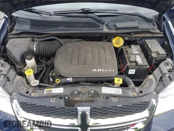 2014 Dodge Grand Caravan SE with VIN 2C4RDGBG0ER187249, listed as a IAAI auction lot 42143078 with 119,097 mi miles and . Bid and sale history available at DreamBid. Image 10.