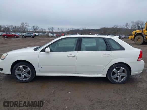 2006 Chevrolet Malibu Maxx LTZ z VIN 1G1ZU63876F141047, wystawiony jako IAAI lot #41739323 z przebiegiem 156 273 mil mil oraz . Historia ofert i sprzedaży dostępna na DreamBid. Obrazek 14.