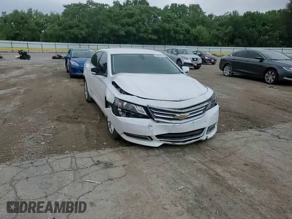 2018 Chevrolet Impala LT с VIN 1G1105SAXJU135951, выставлен на аукционе Copart как лот 70464815 с пробегом 153 582 миль миль и Списание • Salvage title. История ставок и продаж доступна на DreamBid. Изображение 13.
