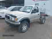 2003 Toyota Tacoma with VIN 5TEPM62N43Z295378, listed as a IAAI auction lot 43436183 with 199,494 mi miles and . Bid and sale history available at DreamBid. Image 2.