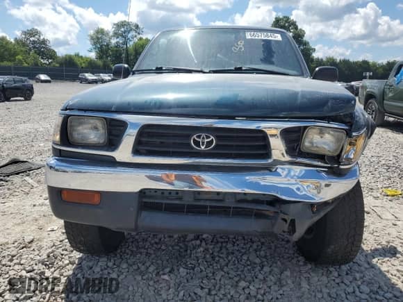 1997 Toyota Tacoma z VIN 4TAWN72N2VZ272710, wystawiony jako Copart lot #66575845 z przebiegiem 276 169 mil mil oraz Czysty tytuł • Clean title. Historia ofert i sprzedaży dostępna na DreamBid. Obrazek 5.