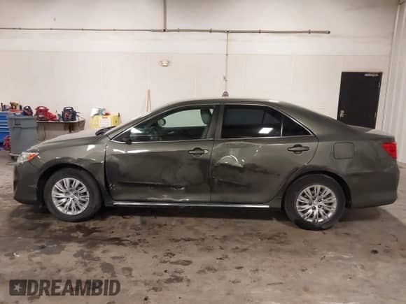 2012 Toyota Camry LE with VIN 4T4BF1FK7CR236018, listed as a IAAI auction lot 43372295 with 177,708 mi miles and . Bid and sale history available at DreamBid. Image 14.
