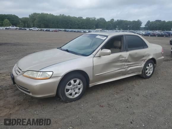 2002 Honda Accord EX with VIN JHMCG660X2C002471, listed as a Copart auction lot 57236995 with 299,618 mi miles and Salvage title. Bid and sale history available at DreamBid. Image 1.