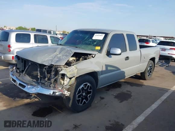 2003 GMC Sierra 1500 SLE with VIN 2GTEC19T731162460, listed as a IAAI auction lot 43045083 with 231,579 mi miles and . Bid and sale history available at DreamBid. Image 18.
