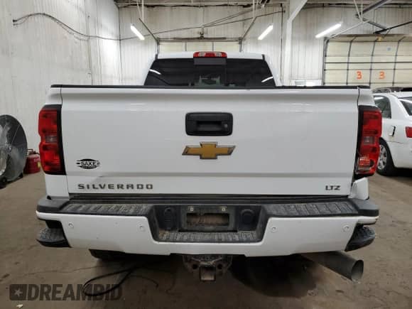 2015 Chevrolet Silverado 3500HD LTZ с VIN 1GC4K0E80FF599384, выставлен на аукционе Copart как лот 76975984 с пробегом 73 351 миль миль и Списание • Salvage title. История ставок и продаж доступна на DreamBid. Изображение 6.