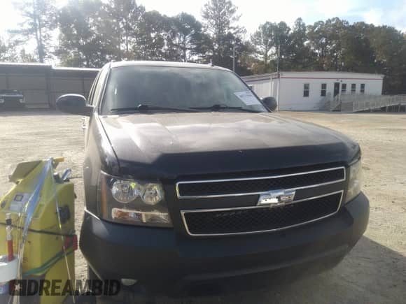 2010 Chevrolet Suburban LT z VIN 1GNUCJE01AR196820, wystawiony jako IAAI lot #40713946 z przebiegiem 234 838 mil mil oraz . Historia ofert i sprzedaży dostępna na DreamBid. Obrazek 6.