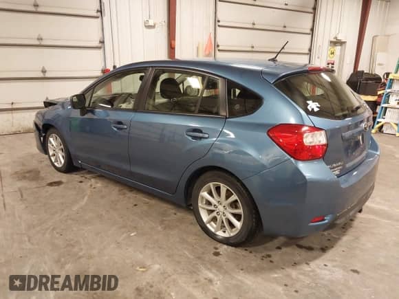2014 Subaru Impreza Premium with VIN JF1GPAC61E8328039, listed as a IAAI auction lot 43273353 with 112,304 mi miles and . Bid and sale history available at DreamBid. Image 3.
