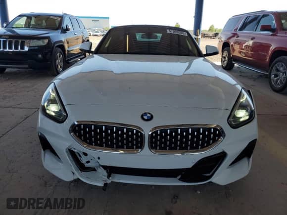2020 BMW Z4 sDrive30i with VIN WBAHF3C0XLWW60530, listed as a Copart auction lot 57099555 with 20,464 mi miles and Salvage title. Bid and sale history available at DreamBid. Image 5.